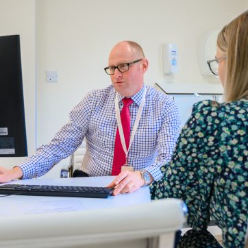 Consultant in discussion with a patient