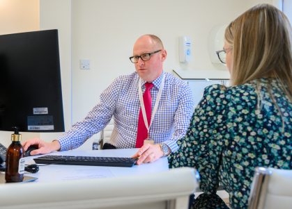 Consultant in discussion with a patient