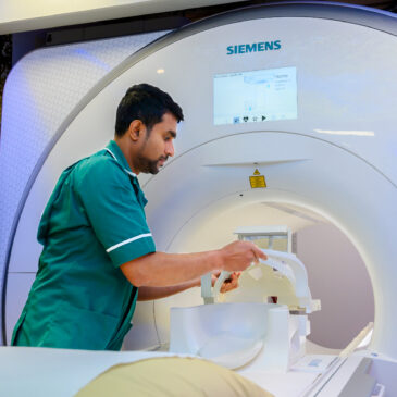 A technician operating the MRI machine at the New Foscote Hospital